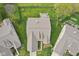 Overhead view of a home with a well-maintained lawn, deck, and fenced backyard within a neighborhood at 1361 Trescott Dr, Westfield, IN 46074