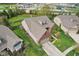 Aerial view of the home showcasing its brick and vinyl exterior, attached garage, and well-manicured lawn at 1361 Trescott Dr, Westfield, IN 46074