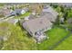 Aerial view showcasing the home's backyard, deck, fenced yard, and well-maintained lawn at 1361 Trescott Dr, Westfield, IN 46074