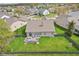 Aerial view of the home's backyard featuring a deck, fenced yard, and well-manicured lawn at 1361 Trescott Dr, Westfield, IN 46074