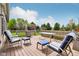Relaxing outdoor deck with comfortable seating, perfect for enjoying the backyard views at 1361 Trescott Dr, Westfield, IN 46074