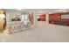 Spacious finished basement with plush carpeting, a piano, and comfortable seating at 1361 Trescott Dr, Westfield, IN 46074