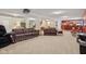 Large finished basement with carpeting, seating, bar, and stairs at 1361 Trescott Dr, Westfield, IN 46074