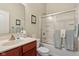 Bathroom with a vanity, toilet, and shower with sliding glass doors at 1361 Trescott Dr, Westfield, IN 46074
