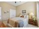 Cozy bedroom with a double bed, a nightstand, and wall decor at 1361 Trescott Dr, Westfield, IN 46074