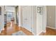Hallway with hardwood flooring and a double-door closet at 1361 Trescott Dr, Westfield, IN 46074