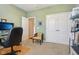 Spare home office area features an open doorway, neutral carpet, and classic chair at 1361 Trescott Dr, Westfield, IN 46074
