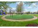 Community playground with swings, slides, and soft turf for safe play in a Gathering-friendly environment at 1361 Trescott Dr, Westfield, IN 46074