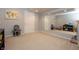 Finished basement playroom features a mirrored wall and ample space for activities at 13948 Silver Stream Dr, Carmel, IN 46032