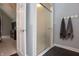Modern bathroom featuring a glass enclosed shower and gray walls at 13948 Silver Stream Dr, Carmel, IN 46032