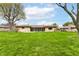 Expansive backyard with lush green lawn, perfect for outdoor activities and entertaining at 143 Beechview Ln, Indianapolis, IN 46217
