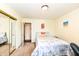 Cozy bedroom with carpet and a queen bed, closet, and neutral decor at 143 Beechview Ln, Indianapolis, IN 46217