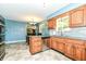 Modern kitchen with stainless steel appliances, a breakfast bar, and easy access to a dining area at 143 Beechview Ln, Indianapolis, IN 46217
