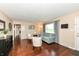 Cozy living room features hardwood floors, a comfortable couch, neutral walls, and bright natural light at 143 Beechview Ln, Indianapolis, IN 46217