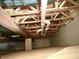 Exposed basement ceiling showing beams and pipes, providing access for maintenance and future upgrades at 14323 Chariots Whisper Dr, Carmel, IN 46074