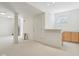 Basement with neutral carpet, wet bar, and white walls for a bright and inviting space at 14323 Chariots Whisper Dr, Carmel, IN 46074