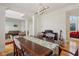 Elegant dining room with hardwood floors and ample seating for dinner guests at 14323 Chariots Whisper Dr, Carmel, IN 46074