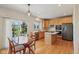 Bright kitchen with stainless steel appliances, ample counter space, and an adjacent dining area at 14323 Chariots Whisper Dr, Carmel, IN 46074