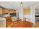 Well-lit kitchen with modern appliances, a functional center island, and plenty of cabinet space at 14323 Chariots Whisper Dr, Carmel, IN 46074