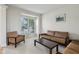 Inviting living room featuring a neutral color palette, comfortable seating, and ample natural light at 14323 Chariots Whisper Dr, Carmel, IN 46074