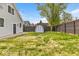 Spacious backyard with privacy fence, shed and lawn at 15 N Campbell Ave, Indianapolis, IN 46219