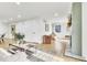 Bright living room with hardwood floors, a modern fireplace, and an open layout at 15 N Campbell Ave, Indianapolis, IN 46219
