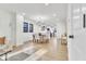 Open living and dining area with modern lighting and hardwood floors throughout at 15 N Campbell Ave, Indianapolis, IN 46219