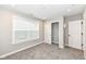 Bright bedroom with a carpet floor, closet, and window at 17066 Cole Evans Dr, Noblesville, IN 46060