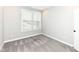 This bedroom has a window and neutral carpet flooring at 17066 Cole Evans Dr, Noblesville, IN 46060