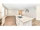 Bright kitchen with an island, stainless steel appliances, and granite countertops, adding modern elegance at 17066 Cole Evans Dr, Noblesville, IN 46060