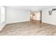 Spacious and bright living room with neutral walls and sleek flooring, perfect for modern living at 17066 Cole Evans Dr, Noblesville, IN 46060