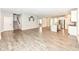 Open-concept living room featuring stylish flooring, creating an inviting and spacious atmosphere at 17066 Cole Evans Dr, Noblesville, IN 46060