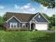 Charming single-story home with blue siding, a well-manicured lawn, and an attached two-car garage at 20432 Atchison Way, Westfield, IN 46074
