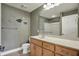 Clean bathroom featuring a well-lit vanity, modern fixtures, and decorative fish art at 20971 Shoreline Ct # 306, Noblesville, IN 46062