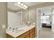 Bathroom featuring white countertops and a large mirror open to a bedroom at 20971 Shoreline Ct # 306, Noblesville, IN 46062