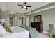 Tranquil bedroom with a comfortable bed, dresser, and views leading to the bathroom and closet space at 20971 Shoreline Ct # 306, Noblesville, IN 46062
