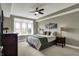 Bright bedroom with a large window, comfortable bed, and modern decor, creating a peaceful retreat at 20971 Shoreline Ct # 306, Noblesville, IN 46062