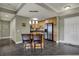 Kitchen featuring a breakfast bar with modern pendant lighting and neutral colors at 20971 Shoreline Ct # 306, Noblesville, IN 46062