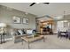Inviting living room with a comfortable couch, stylish coffee table, and open view to the kitchen and dining area at 20971 Shoreline Ct # 306, Noblesville, IN 46062
