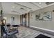 Lobby with tile flooring, comfortable seating, elevator access and decorative art at 20971 Shoreline Ct # 306, Noblesville, IN 46062