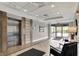 Stylish lobby with a modern elevator, tiled floors, and a comfortable waiting area with natural light at 20971 Shoreline Ct # 306, Noblesville, IN 46062