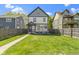 Lush backyard showcasing a spacious lawn, garden plot, and cozy patio area for outdoor enjoyment at 2225 Alabama St, Indianapolis, IN 46205