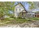 Charming two-story home with a well-maintained lawn and lovely curb appeal at 2225 Alabama St, Indianapolis, IN 46205