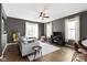 Bright living room featuring hardwood floors and neutral decor at 2225 Alabama St, Indianapolis, IN 46205