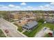 Aerial view of the home in close proximity to the nearby school and playground at 2349 Indianapolis Ave, Indianapolis, IN 46208