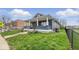 Charming home with a covered porch and steps to the front door at 2349 Indianapolis Ave, Indianapolis, IN 46208