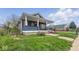 Charming home with a covered porch and steps to the front door at 2349 Indianapolis Ave, Indianapolis, IN 46208