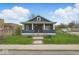 Charming single-story home featuring a cozy front porch and neatly trimmed landscaping at 2349 Indianapolis Ave, Indianapolis, IN 46208