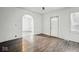 Bright and open living area featuring beautiful hardwood flooring and ample natural light at 2349 Indianapolis Ave, Indianapolis, IN 46208
