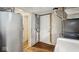 View of the utility room with a water heater, furnace, and laundry appliances at 2349 Indianapolis Ave, Indianapolis, IN 46208